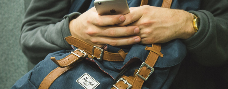 Man with Phone and Bag