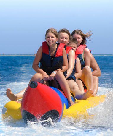 Group enjoying a banana boat ride