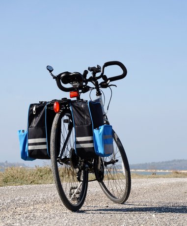 Cyclist riding through scenic landscape