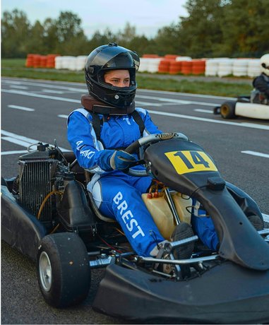 Go kart racer in action on the track