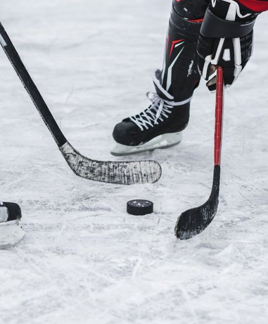 Hockey player in full gear on the ice