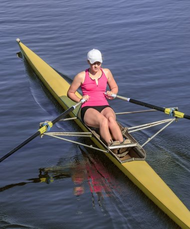 Rowers on calm inshore water